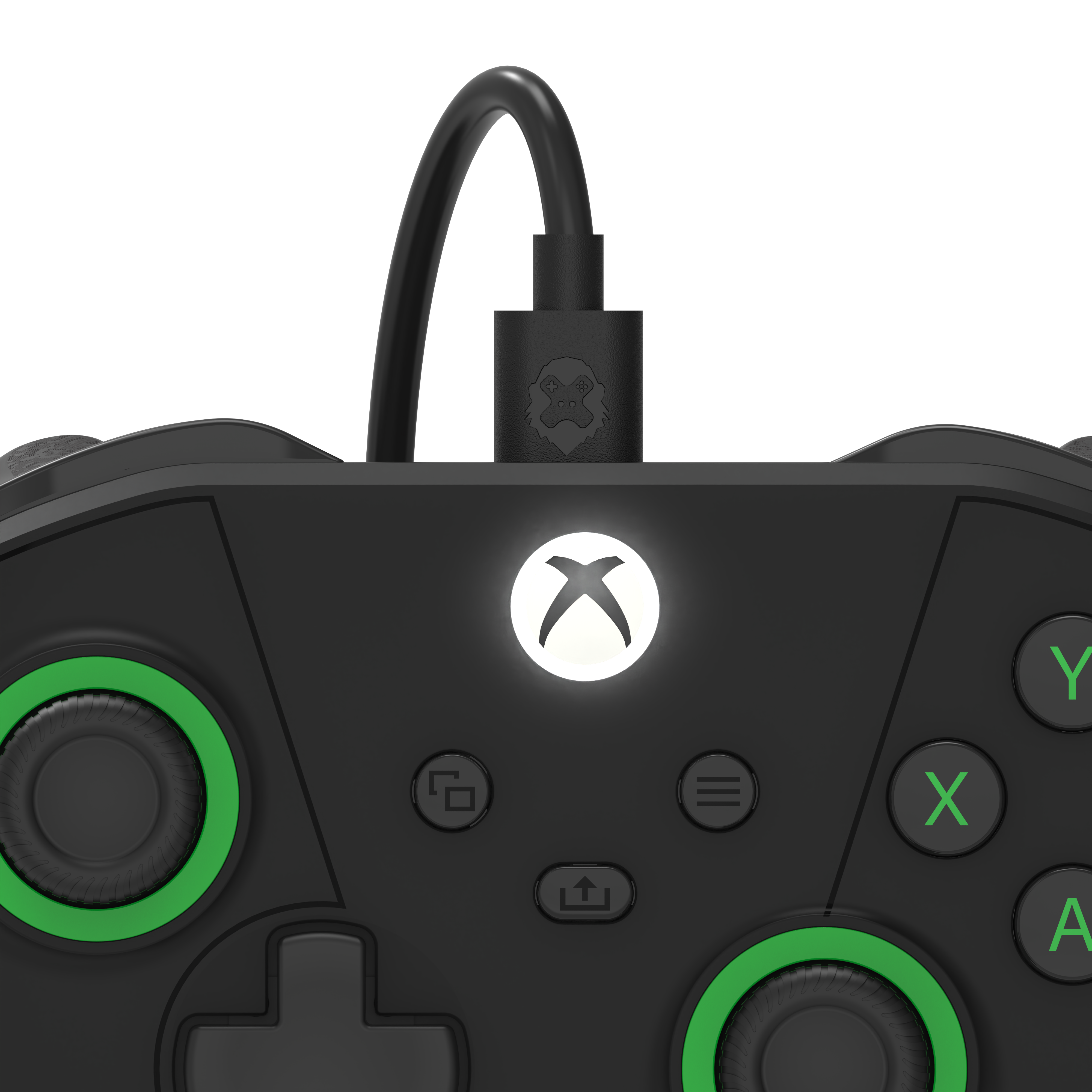 Black gaming controller with green accents on a white background